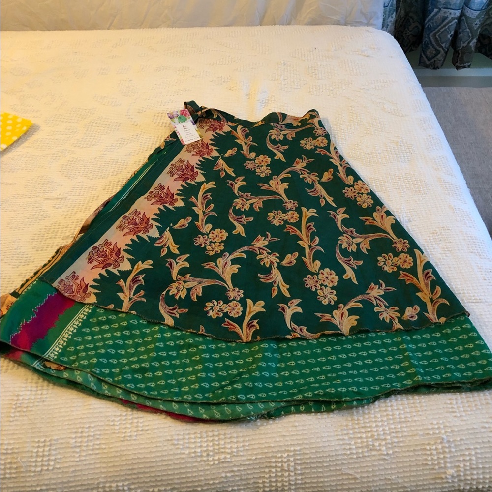 Green Rangeelaa tea-length wrap skirt.